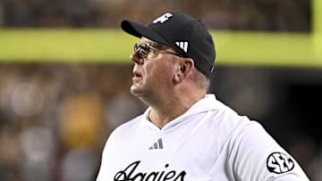 Oct 26, 2024; College Station, Texas, USA; Texas A&M Aggies head coach Mike Elko watches the replay in the third quarter against the LSU Tigers at Kyle Field. Mandatory Credit: Maria Lysaker-Imagn Images. 