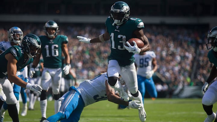 Eagles' Nelson Agholor (13) hurdles his way into the end zone against the Lions at Lincoln Financial Field. The Lions defeated the Eagles 27-24, Sunday, Sept. 22.