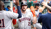 Sep 15, 2024; Anaheim, California, USA;  Houston Astros right fielder Kyle Tucker (21) is greeted in the dugout after scoring a run during the fourth inning against the Los Angeles Angels at Angel Stadium. Mandatory Credit: Kiyoshi Mio-Imagn Images
