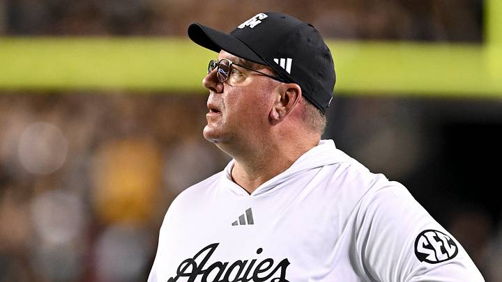 Oct 26, 2024; College Station, Texas, USA; Texas A&M Aggies head coach Mike Elko watches the replay in the third quarter against the LSU Tigers at Kyle Field. Mandatory Credit: Maria Lysaker-Imagn Images.