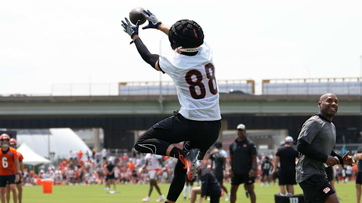 Jul 26, 2024; Cincinnati, OH, USA; Cincinnati Bengals tight end Mike Gesicki (88) completes a catch in the end zone during training camp practice at Kettering Health Practice Fields. Mandatory Credit: Kareem Elgazzar-Imagn Images