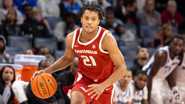 Arkansas Razorbacks guard D.J. Wagner dribbles the ball up the court against the Memphis Tigers during the second half at Fed