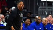 Tulsa Golden Hurricane head coach Frank Haith instructs the team in the second half of an NCAA men's college basketball game against the Cincinnati Bearcats