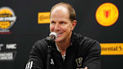 Nov 17, 2023; Las Vegas, Nevada, USA; Washington Huskies head coach Mike Hopkins answers questions after the Huskies defeated the Xavier Musketeers 74-71at T-Mobile Arena. Mandatory Credit: Stephen R. Sylvanie-Imagn Images