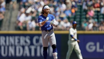 Jul 7, 2024; Seattle, Washington, USA; Toronto Blue Jays shortstop Bo Bichette (11) claps on second after hitting a ground rule double against the Seattle Mariners during the fourth inning at T-Mobile Park. John Froschauer-USA TODAY Sports