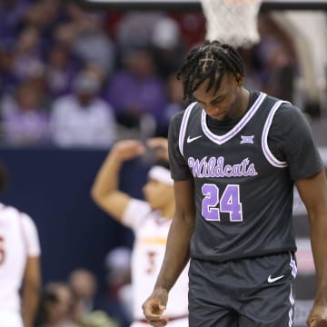 Kansas State junior forward Arthur Kaluma (24) looks down after a play in the second half of the quarterfinal round in the Big 12 Tournament inside the T-Mobile Center in Kansas City, Mo.