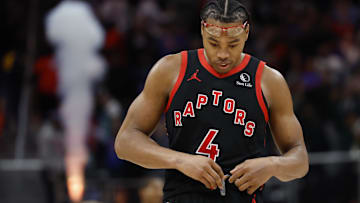 Scottie Barnes walks off the court