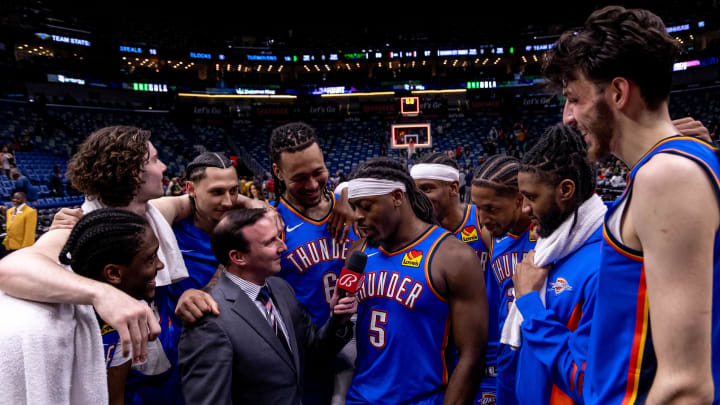 Apr 29, 2024; New Orleans, Louisiana, USA; Oklahoma City Thunder guard Luguentz Dort (5) and forward Jalen Williams (8) celebrate a win over the New Orleans Pelicans after game four of the first round for the 2024 NBA playoffs at Smoothie King Center. Mandatory Credit: Stephen Lew-USA TODAY Sports