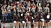 Mississippi State Bulldogs fans cheer during the second half of the game against the Mississippi Rebels at Humphrey Coliseum.