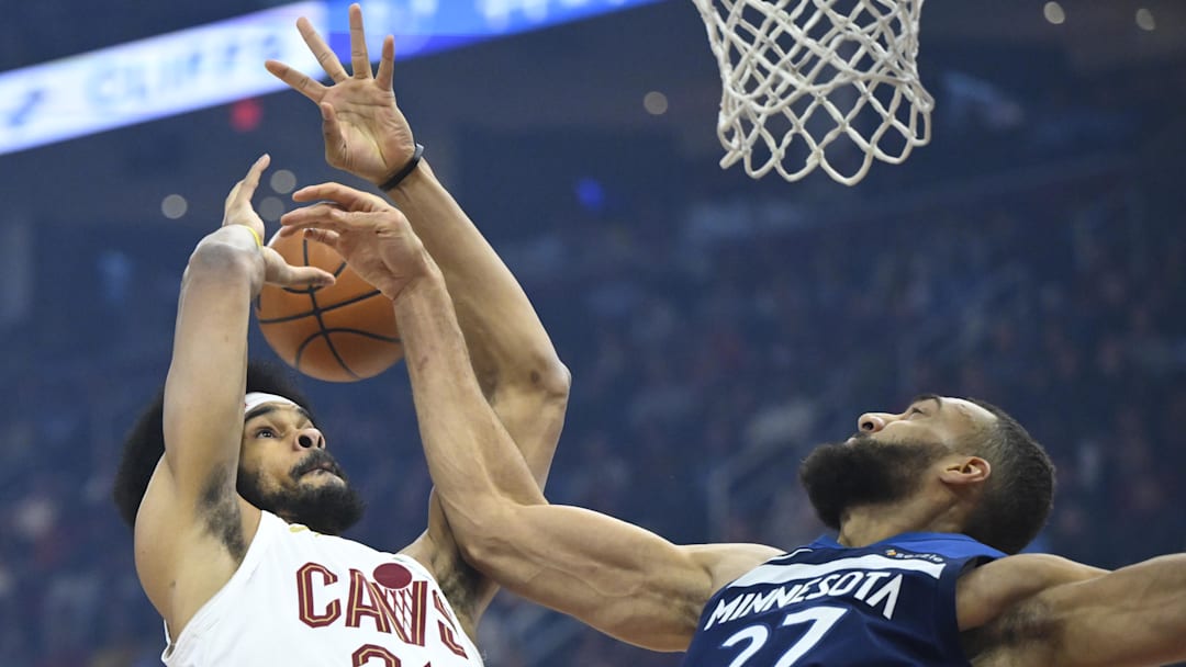 Feb 10, 2025; Cleveland, Ohio, USA; Cleveland Cavaliers center Jarrett Allen (31) loses the ball beside Minnesota Timberwolves center Rudy Gobert (27) in the first quarter at Rocket Mortgage FieldHouse. Mandatory Credit: David Richard-Imagn Images
