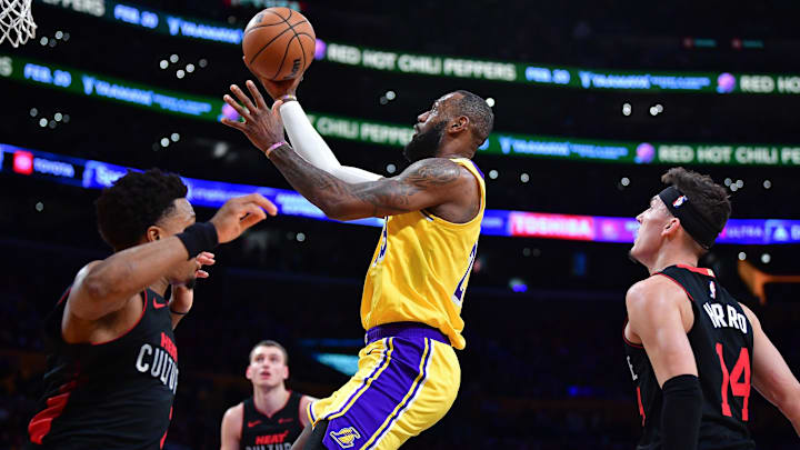 Jan 3, 2024; Los Angeles, California, USA; Los Angeles Lakers forward LeBron James (23) moves to the basket against the Miami Heat during the second half at Crypto.com Arena. Mandatory Credit: Gary A. Vasquez-Imagn Images