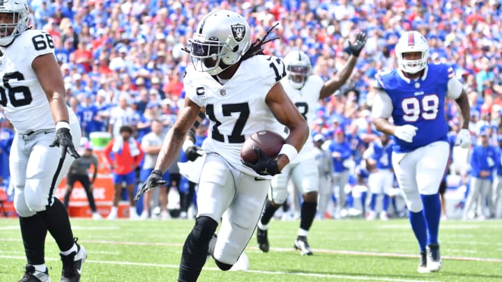 Sep 17, 2023; Orchard Park, New York, USA; Las Vegas Raiders wide receiver Davante Adams (17) runs for the end zone to score a touchdown in the first quarter against the Buffalo Bills at Highmark Stadium. Mandatory Credit: Mark Konezny-USA TODAY Sports