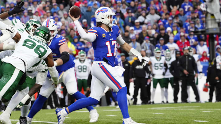 Dec 29, 2024; Orchard Park, New York, USA; Buffalo Bills quarterback Josh Allen (17) throws the ball against the New York Jets during the first half at Highmark Stadium.