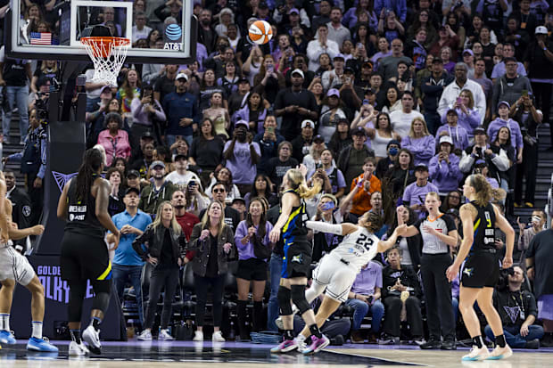 Golden State Valkyries guard Veronica Burton shoots and scores after she is fouled by a Dallas Wings player.