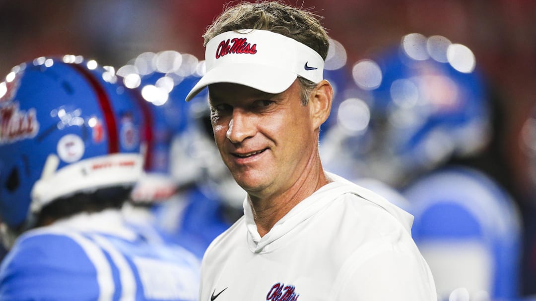 Nov 15, 2025; Oxford, Mississippi, USA; Mississippi Rebels head coach Lane Kiffin watches pregame warmups against the Florida Gators at Vaught-Hemingway Stadium. Mandatory Credit: Petre Thomas-Imagn Images