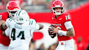 Rutgers Scarlet Knights quarterback Athan Kaliakmanis (16) looks for an open teammate in the first quarter, Thursday, August 28, 2025.