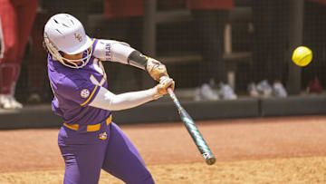 May 8, 2025; Athens, GA, USA; LSU utility Tori Edwards (42) drives in a run with a hit against Oklahoma at Jack Turner Stadium. Mandatory Credit: Dale Zanine-Imagn Images