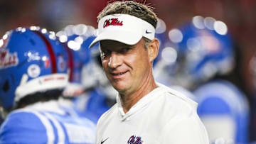 Nov 15, 2025; Oxford, Mississippi, USA; Mississippi Rebels head coach Lane Kiffin watches pregame warmups against the Florida Gators at Vaught-Hemingway Stadium. Mandatory Credit: Petre Thomas-Imagn Images