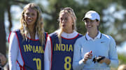 Nov 12, 2025; Belleair, Florida, USA; Indiana Fever guard Sophie Cunningham (8) and guard Lexie Hull (10) look on as guard Caitlin Clark (22) plays in the Annika Pro-Am golf tournament at Pelican Golf Club. Mandatory Credit: Nathan Ray Seebeck-Imagn Images
