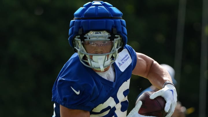 Indianapolis Colts running back Evan Hull (26) runs with the ball during the Colts’ training camp on Friday, Aug. 9, 2024, at Grand Park Sports Complex in Westfield.