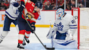 Apr 8, 2025; Sunrise, Florida, USA; Toronto Maple Leafs goaltender Joseph Woll (60) makes a save against Florida Panthers center Brad Marchand (63) during the second period at Amerant Bank Arena. Mandatory Credit: Sam Navarro-Imagn Images