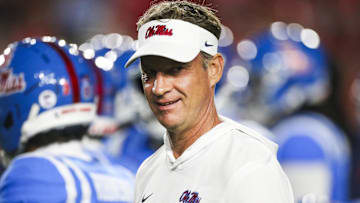 Nov 15, 2025; Oxford, Mississippi, USA; Mississippi Rebels head coach Lane Kiffin watches pregame warmups against the Florida Gators at Vaught-Hemingway Stadium.