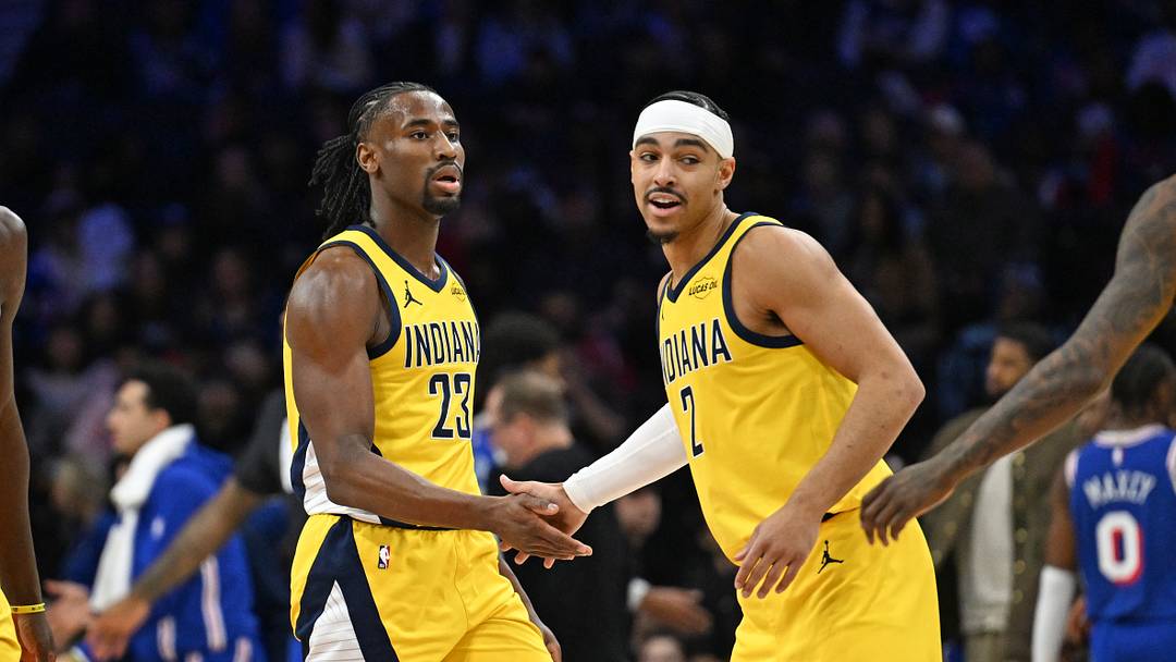 Jan 19, 2026; Philadelphia, Pennsylvania, USA; Indiana Pacers guard Aaron Nesmith (23) and guard Andrew Nembhard (2) celebrate against the Philadelphia 76ers during the second quarter at Xfinity Mobile Arena. Mandatory Credit: Eric Hartline-Imagn Images