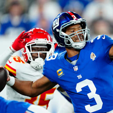 New York Giants quarterback Russell Wilson (3) passes to a teammate before Kansas City Chiefs cornerback Jaylen Watson (35) can get to him, Sunday, September 21, 2025.