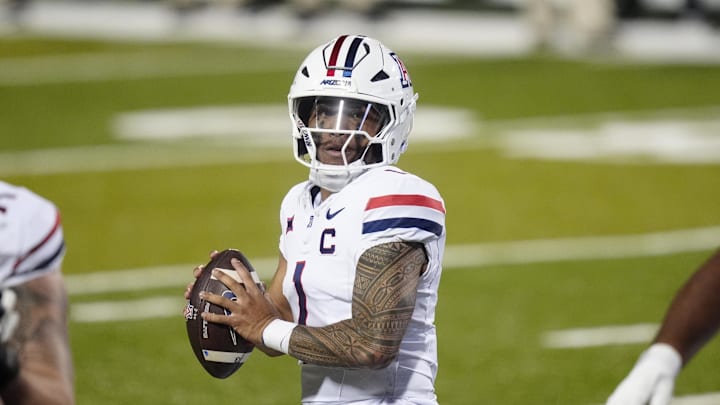 Nov 1, 2025; Boulder, Colorado, USA; Arizona Wildcats quarterback Noah Fifita (1) prepares to pass the ball in second quarter against the Colorado Buffaloes at Folsom Field. Mandatory Credit: Ron Chenoy-Imagn Images