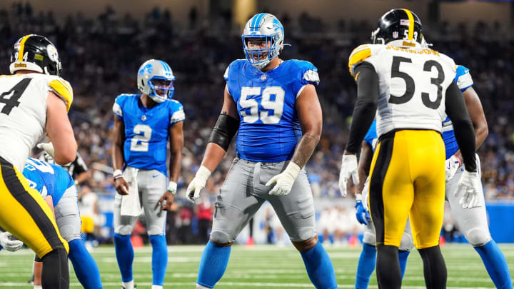 Detroit Lions offensive tackle Giovanni Manu (59).