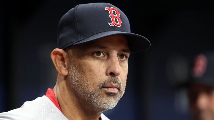 Red Sox manager Alex Cora looks on from the dugout during a game against the Tampa Bay Rays at Tropicana Field.