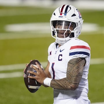Nov 1, 2025; Boulder, Colorado, USA; Arizona Wildcats quarterback Noah Fifita (1) prepares to pass the ball in second quarter against the Colorado Buffaloes at Folsom Field. Mandatory Credit: Ron Chenoy-Imagn Images
