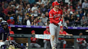 Sep 20, 2025; Denver, Colorado, USA; Los Angeles Angels designated hitter Mike Trout (27) watches after hitting his 400th career home run during the eighth inning against the Colorado Rockies at Coors Field. Mandatory Credit: Christopher Hanewinckel-Imagn Images