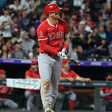 Sep 20, 2025; Denver, Colorado, USA; Los Angeles Angels designated hitter Mike Trout (27) watches after hitting his 400th career home run during the eighth inning against the Colorado Rockies at Coors Field. Mandatory Credit: Christopher Hanewinckel-Imagn Images