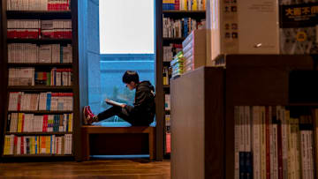 A reader in Eslite Bookstore in Suzhou. Novel Travels can take readers all over the world.