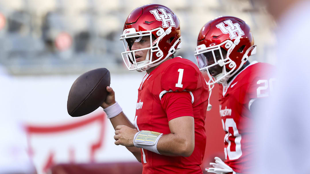 Aug 28, 2025; Houston, Texas, USA; Houston Cougars quarterback Conner Weigman (1) warms up before the game against the Stephen F. Austin Lumberjacks at TDECU Stadium. Mandatory Credit: Troy Taormina-Imagn Images