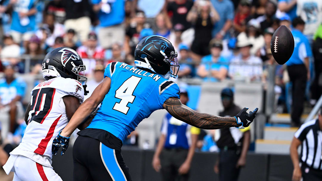  Carolina Panthers wide receiver Tetairoa McMillan (4) is unable to catch a pass in the end zone as Atlanta Falcons cornerback Dee Alford (20) defends in the third quarter at Bank of America Stadium. 
