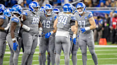 Detroit Lions linebacker Alex Anzalone (34) talks in the defensive huddle.