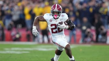 Jan 1, 2024; Pasadena, CA, USA; Alabama Crimson Tide running back Justice Haynes (22) runs the ball against the Michigan Wolverines during the second half in the 2024 Rose Bowl college football playoff semifinal game at Rose Bowl. Mandatory Credit: Kirby Lee-USA TODAY Sports