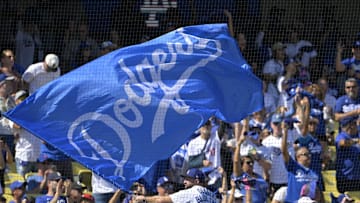 Oct 14, 2024; Los Angeles, California, USA; Los Angeles Dodgers fans cheer before game two against the New York Mets in the NLCS for the 2024 MLB Playoffs at Dodger Stadium. Mandatory Credit: Jayne Kamin-Oncea-Imagn Images