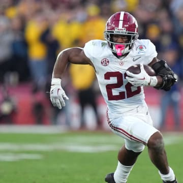 Jan 1, 2024; Pasadena, CA, USA; Alabama Crimson Tide running back Justice Haynes (22) runs the ball against the Michigan Wolverines during the second half in the 2024 Rose Bowl college football playoff semifinal game at Rose Bowl. Mandatory Credit: Kirby Lee-USA TODAY Sports