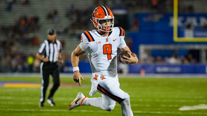 Sep 8, 2023; Lawrence, Kansas, USA; Illinois Fighting Illini quarterback Luke Altmyer (9) runs for a touchdown during the second half against the Kansas Jayhawks at David Booth Kansas Memorial Stadium. Mandatory Credit: Jay Biggerstaff-USA TODAY Sports