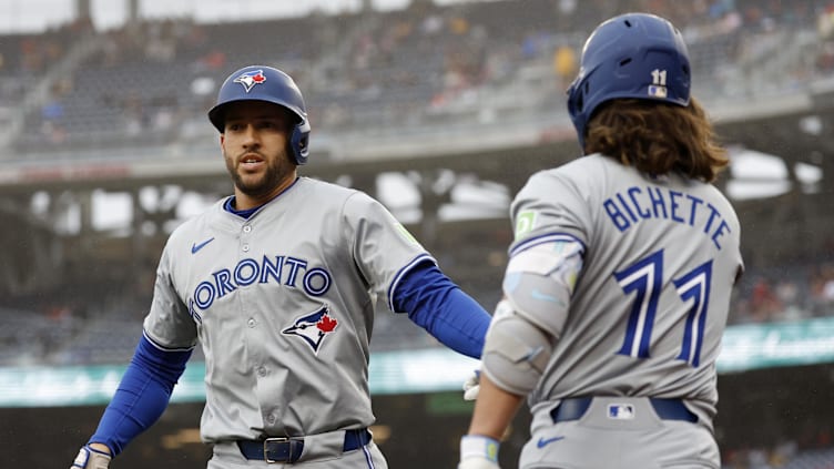 May 4, 2024; Washington, District of Columbia, USA; George Springer (4) celebrates with Blue Jays shortstop Bo Bichette (11). Mandatory Credit: Geoff Burke-USA TODAY Sports