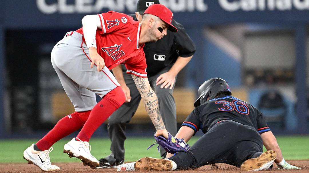 Toronto Blue Jays left fielder Davis Schneider (36) steals second base ahead of a tag from Los Angeles Angels shortstop Zach Neto in the second inning of a May 8 game at Rogers Centre. This is one of the 26 stolen bases Toronto has as a team this season. Toronto Blue Jays left fielder Davis Schneider (36) steals second base ahead of a tag from Los Angeles Angels shortstop Zach Neto in the second inning of a May 8 game at Rogers Centre. This is one of the 26 stolen bases Toronto has as a team this season.
