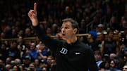 Dec 2, 2025; Durham, North Carolina, USA; Duke Blue Devils head coach Jon Scheyer directs his team during the first half against the Florida Gators at Cameron Indoor Stadium. Mandatory Credit: Rob Kinnan-Imagn Images