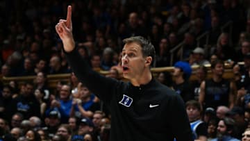Dec 2, 2025; Durham, North Carolina, USA; Duke Blue Devils head coach Jon Scheyer directs his team during the first half against the Florida Gators at Cameron Indoor Stadium. Mandatory Credit: Rob Kinnan-Imagn Images