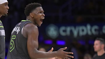 Apr 19, 2025; Los Angeles, California, USA; Minnesota Timberwolves guard Anthony Edwards (5) reacts toward referee Brian Forte (45) after called for a foul on Los Angeles Lakers forward LeBron James (23) in the second half at Crypto.com Arena. Mandatory Credit: Jayne Kamin-Oncea-Imagn Images