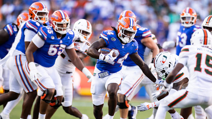 Aug 31, 2024; Gainesville, Florida, USA; Florida Gators running back Ja'Kobi Jackson (24) runs the ball against the Miami Hurricanes during the second half at Ben Hill Griffin Stadium. Mandatory Credit: Matt Pendleton-Imagn Images