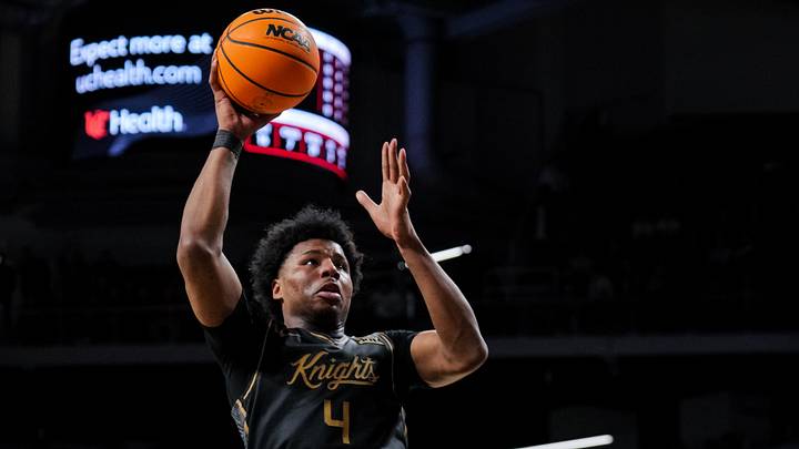 Feb 8, 2026; Cincinnati, Ohio, USA;  UCF Knights forward Jamichael Stillwell (4) shoots against the Cincinnati Bearcats in the second half at Fifth Third Arena. Mandatory Credit: Aaron Doster-Imagn Images
