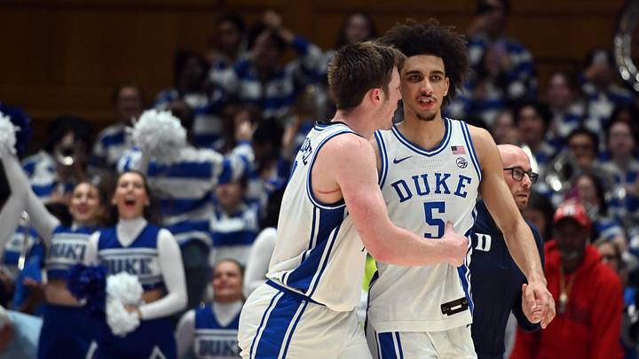 Jan 27, 2025; Durham, North Carolina, USA; Duke basketball forward Kon Knueppel (7) and guard Tyrese Proctor (5) react after a win against the North Carolina State Wolfpack at Cameron Indoor Stadium.  The Blue Devils won 74-64. 